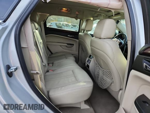 ✅ 2013 Cadillac SRX Premium Collection • VIN: 3GYFNJE39DS652225 • Лот: 93147625. Опубликован ранее на Copart с пробегом 117 549 миль. Бесплатный доступ к архиву аукционных продаж из США и подробный отчёт об истории автомобиля на DreamBid. Изображение 11.