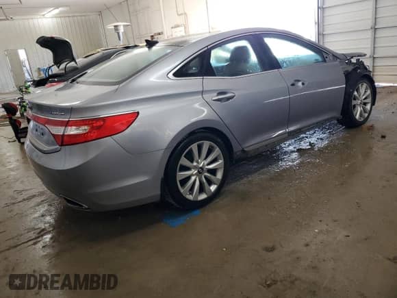 2014 Hyundai Azera Limited с VIN KMHFH4JG7EA411172, выставлен на аукционе Copart как лот 42776985 с пробегом 144 038 миль миль и Списание • Salvage title. История ставок и продаж доступна на DreamBid. Изображение 3.