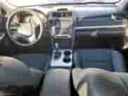 2014 Toyota Camry L with VIN 4T1BF1FK4EU744573, listed as a Copart auction lot 82307495 with 124,046 mi miles and Salvage title. Bid and sale history available at DreamBid. Image 8.