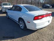 ✅ 2014 Dodge Charger Police • VIN: 2C3CDXAT2EH350711 • Lot: 43688159. Listed on IAAI with 128,318 mi. Free auction sales archive from the USA and detailed vehicle history report at DreamBid. Image 3.