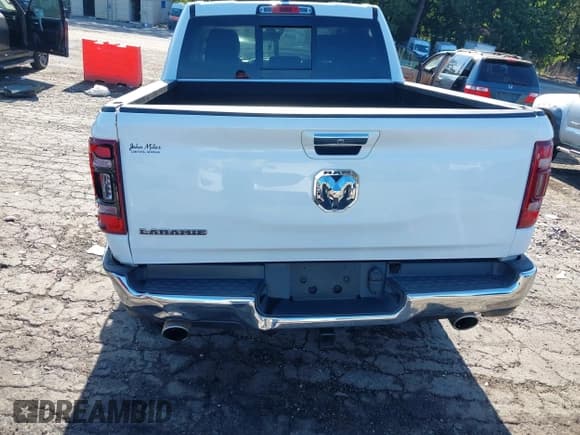 ✅ 2021 Ram 1500 Laramie • VIN: 1C6RREJT4MN630316 • Lot: 42844637. Listed on IAAI with 116,198 mi. Free auction sales archive from the USA and detailed vehicle history report at DreamBid. Image 16.