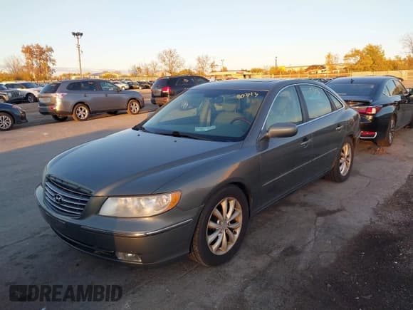 ✅ 2007 Hyundai Azera SE • VIN: KMHFC46F77A194403 • Lot: 43650343. Listed on IAAI with 148,624 mi. Free auction sales archive from the USA and detailed vehicle history report at DreamBid. Image 2.
