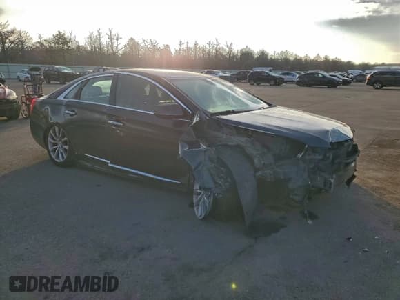 ✅ 2015 Cadillac XTS Luxury • VIN: 2G61M5S39F9203791 • Lot: 82331875. Wystawiony na Copart z przebiegiem 135 011 mil. Bezpłatny archiwum sprzedaży aukcyjnych z USA i szczegółowy raport historii pojazdu na DreamBid. Zdjęcie 4.