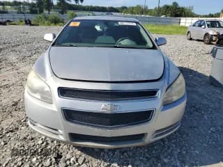 ✅ 2009 Chevrolet Malibu Hybrid • VIN: 1G1ZF575X9F163178 • Lot: 66117214. Listed on Copart with Not provided. Free auction sales archive from the USA and detailed vehicle history report at DreamBid. Image 5.