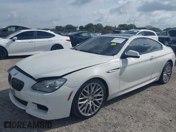 ✅ 2013 BMW 6 Series 650i xDrive • VIN: WBAYM1C58DDZ02668 • Lot: 41986512. Wystawiony na IAAI z przebiegiem 77 302 mil. Bezpłatny archiwum sprzedaży aukcyjnych z USA i szczegółowy raport historii pojazdu na DreamBid. Zdjęcie 2.