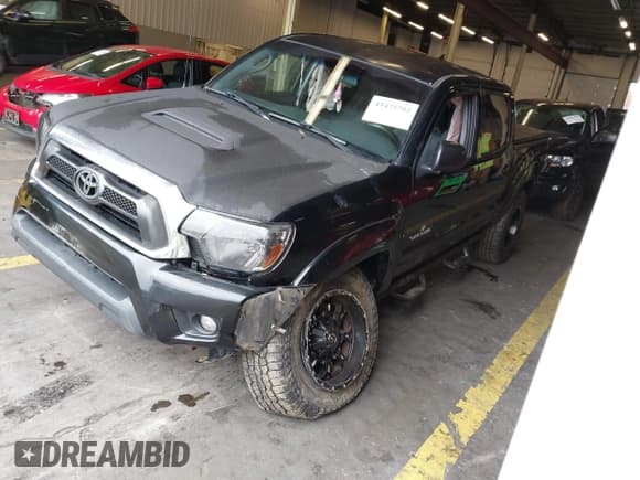 ✅ 2014 Toyota Tacoma • VIN: 3TMLU4ENXEM143779 • Lot: 43475792. Listed on IAAI with 156,975 mi. Free auction sales archive from the USA and detailed vehicle history report at DreamBid. Image 2.
