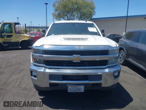 ✅ 2015 Chevrolet Silverado 2500HD LT • VIN: 1GC2CVE87FZ500852 • Lot: 43023197. Listed on IAAI with 214,790 mi. Free auction sales archive from the USA and detailed vehicle history report at DreamBid. Image 13.