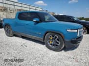 ✅ 2022 Rivian R1T Launch Edition • VIN: 7FCTGAAL1NN002058 • Lot: 80520765. Wystawiony na Copart z przebiegiem 7 177 mil. Bezpłatny archiwum sprzedaży aukcyjnych z USA i szczegółowy raport historii pojazdu na DreamBid. Zdjęcie 4.