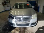 ✅ 2009 Volkswagen Jetta S • VIN: 3VWJZ71K99M010312 • Лот: 84917885. Опубликован ранее на Copart с пробегом 142 057 миль. Бесплатный доступ к архиву аукционных продаж из США и подробный отчёт об истории автомобиля на DreamBid. Изображение 5.