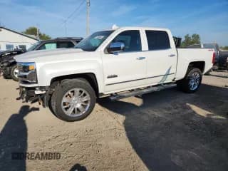 ✅ 2017 Chevrolet Silverado 1500 High Country • VIN: 3GCUKTEJ8HG490421 • Лот: 70999645. Опубликован ранее на Copart с пробегом 79 684 миль. Бесплатный доступ к архиву аукционных продаж из США и подробный отчёт об истории автомобиля на DreamBid. Изображение 1.