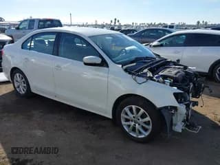 ✅ 2014 Volkswagen Jetta SE • VIN: 3VWD17AJ5EM223778 • Lot: 43757551. Listed on IAAI with 150,093 mi. Free auction sales archive from the USA and detailed vehicle history report at DreamBid. Image 1.