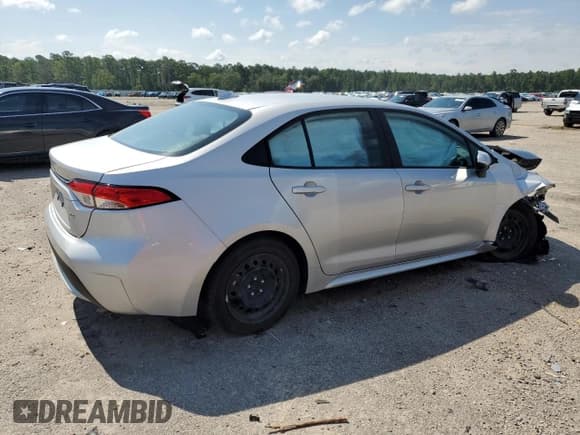 ✅ 2021 Toyota Corolla LE • VIN: 5YFEPMAE1MP258946 • Lot: 65600945. Listed on Copart with 79,598 mi. Free auction sales archive from the USA and detailed vehicle history report at DreamBid. Image 3.