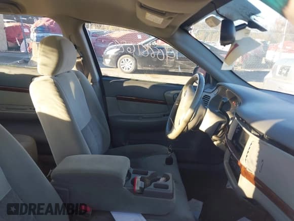 ✅ 2004 Chevrolet Impala • VIN: 2G1WF55E649235355 • Lot: 40881680. Listed on IAAI with 119,816 mi. Free auction sales archive from the USA and detailed vehicle history report at DreamBid. Image 5.