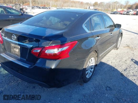 ✅ 2016 Nissan Altima S • VIN: 1N4AL3AP3GC284053 • Lot: 43702465. Listed on IAAI with 74,587 mi. Free auction sales archive from the USA and detailed vehicle history report at DreamBid. Image 4.
