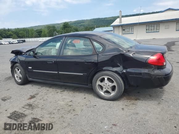 ✅ 2003 Ford Taurus SEL Deluxe • VIN: 1FAHP56SX3A235112 • Lot: 65973905. Wystawiony na Copart z przebiegiem 74 595 mil. Bezpłatny archiwum sprzedaży aukcyjnych z USA i szczegółowy raport historii pojazdu na DreamBid. Zdjęcie 2.