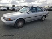 ✅ 1989 Toyota Camry • VIN: JT2VV22E3K0049538 • Lot: 78870034. Wystawiony na Copart z przebiegiem 100 396 mil. Bezpłatny archiwum sprzedaży aukcyjnych z USA i szczegółowy raport historii pojazdu na DreamBid. Zdjęcie 1.