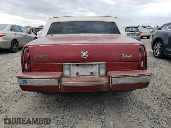 ✅ 1986 Cadillac Eldorado • VIN: 1G6EL5784GU616263 • Lot: 48741325. Wystawiony na Copart z przebiegiem 59 213 mil. Bezpłatny archiwum sprzedaży aukcyjnych z USA i szczegółowy raport historii pojazdu na DreamBid. Zdjęcie 6.