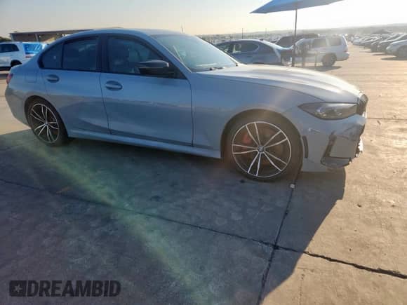 2023 BMW 3 Series 330i z VIN 3MW69FF05P8D29302, wystawiony jako Copart lot #81690055 z przebiegiem 45 083 mil mil oraz Szkoda całkowita • Salvage title. Historia ofert i sprzedaży dostępna na DreamBid. Obrazek 4.