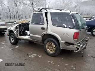 2003 Chevrolet Blazer LS z VIN 1GNCS13X63K129026, wystawiony jako Copart lot #84567954 z przebiegiem Nie podano mil oraz Szkoda całkowita • Salvage title. Historia ofert i sprzedaży dostępna na DreamBid. Obrazek 2.