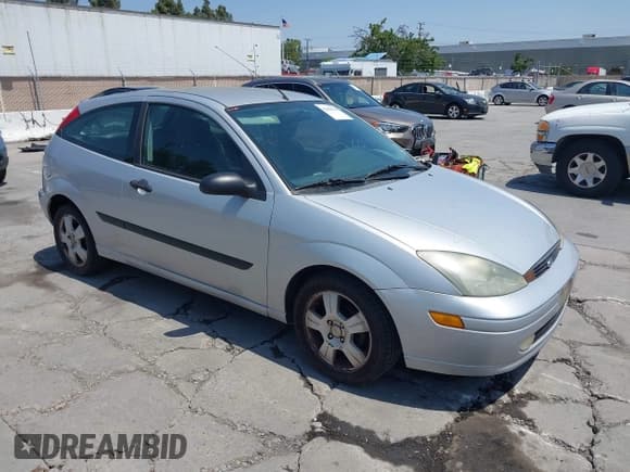 ✅ 2003 Ford Focus ZX3 • VIN: 3FAFP31Z03R173760 • Lot: 42458510. Listed on IAAI with 147,663 mi. Free auction sales archive from the USA and detailed vehicle history report at DreamBid. Image 1.