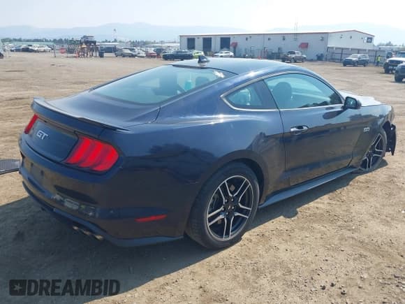 ✅ 2021 Ford Mustang GT • VIN: 1FA6P8CF2M5147469 • Lot: 43120831. Listed on IAAI with 28,250 mi. Free auction sales archive from the USA and detailed vehicle history report at DreamBid. Image 4.