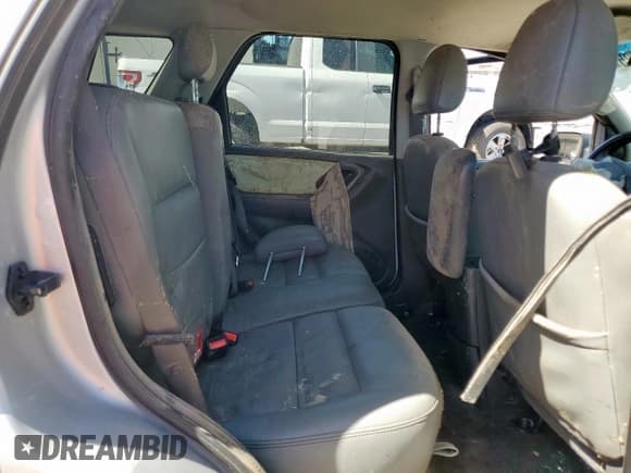 ✅ 2005 Ford Escape Hybrid • VIN: 1FMCU96H75KB95718 • Lot: 60000825. Listed on Copart with Not provided. Free auction sales archive from the USA and detailed vehicle history report at DreamBid. Image 11.