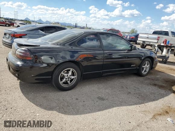 ✅ 1999 Pontiac Grand Prix GTP • VIN: 1G2WR1212XF352746 • Лот: 80581385. Опубликован ранее на Copart с пробегом 183 657 миль. Бесплатный доступ к архиву аукционных продаж из США и подробный отчёт об истории автомобиля на DreamBid. Изображение 3.
