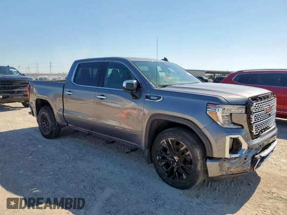 ✅ 2021 GMC Sierra 1500 Denali • VIN: 3GTU9FET8MG337899 • Лот: 89870085. Опубликован ранее на Copart с пробегом Не указан. Бесплатный доступ к архиву аукционных продаж из США и подробный отчёт об истории автомобиля на DreamBid. Изображение 4.