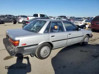 ✅ 1988 Toyota Camry • VIN: JT2SV24E5J3276324 • Lot: 88117355. Listed on Copart with 89,928 mi. Free auction sales archive from the USA and detailed vehicle history report at DreamBid. Image 3.