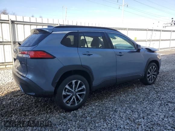 ✅ 2022 Toyota Corolla Cross XLE • VIN: 7MUDAABG6NV026840 • Lot: 90333755. Listed on Copart with 64,209 mi. Free auction sales archive from the USA and detailed vehicle history report at DreamBid. Image 3.