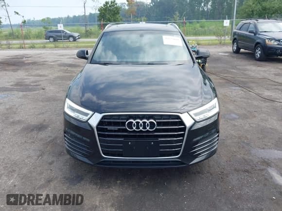 ✅ 2017 Audi Q3 Prestige • VIN: WA1GCCFS9HR005523 • Lot: 42573661. Listed on IAAI with 128,154 mi. Free auction sales archive from the USA and detailed vehicle history report at DreamBid. Image 13.