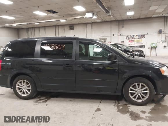 ✅ 2016 Dodge Grand Caravan SXT • VIN: 2C4RDGCG9GR225367 • Лот: 43688013. Опубликован ранее на IAAI с пробегом 61 256 миль. Бесплатный доступ к архиву аукционных продаж из США и подробный отчёт об истории автомобиля на DreamBid. Изображение 14.