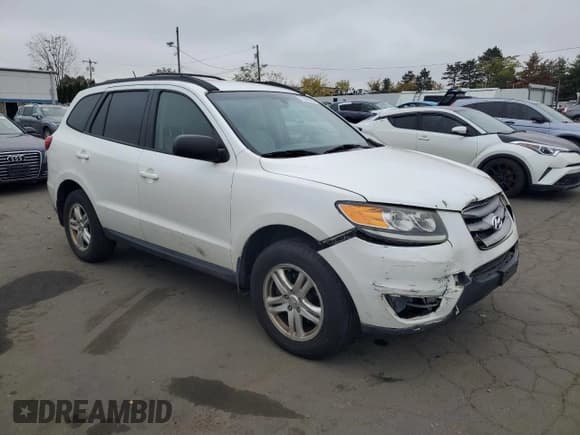 ✅ 2012 Hyundai Santa Fe GLS • VIN: 5XYZGDAGXCG116939 • Lot: 75958794. Listed on Copart with 262,257 mi. Free auction sales archive from the USA and detailed vehicle history report at DreamBid. Image 4.
