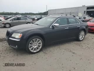 ✅ 2011 Chrysler 300 C • VIN: 2C3CA6CT2BH514633 • Lot: 84243005. Listed on Copart with 265,540 mi. Free auction sales archive from the USA and detailed vehicle history report at DreamBid. Image 1.