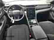 2025 Jeep Grand Cherokee Altitude X with VIN 1C4RJGAGXSC281508, listed as a Copart auction lot 64841415 with 2,231 mi miles and Salvage title. Bid and sale history available at DreamBid. Image 8.