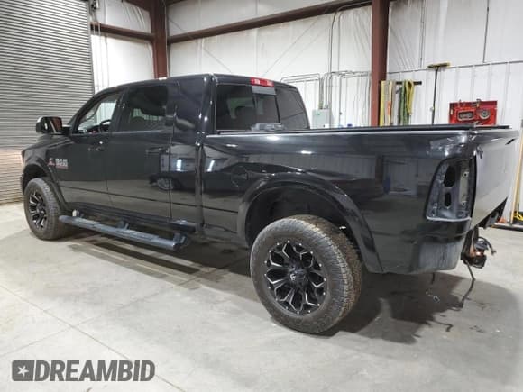 ✅ 2018 Ram 3500 Laramie • VIN: 3C63R3ML9JG120442 • Lot: 85611004. Listed on Copart with 91,304 mi. Free auction sales archive from the USA and detailed vehicle history report at DreamBid. Image 2.