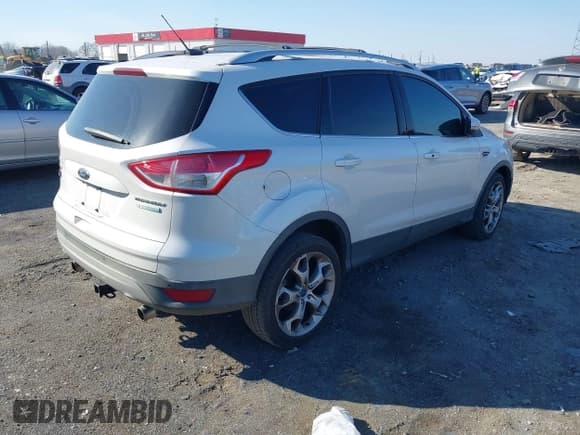 ✅ 2013 Ford Escape Titanium • VIN: 1FMCU0J93DUB00098 • Lot: 41693605. Listed on IAAI with 172,862 mi. Free auction sales archive from the USA and detailed vehicle history report at DreamBid. Image 4.