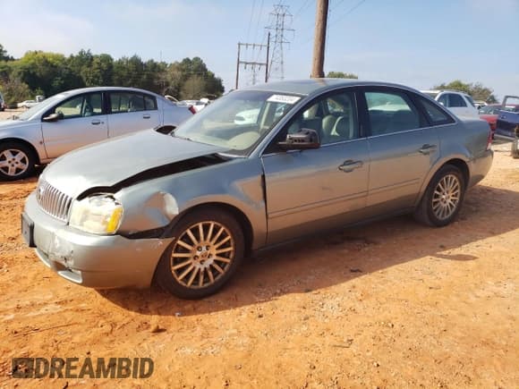 ✅ 2005 Mercury Montego Premier • VIN: 1MEFM42135G618664 • Lot: 74363204. Listed on Copart with 123,264 mi. Free auction sales archive from the USA and detailed vehicle history report at DreamBid. Image 1.
