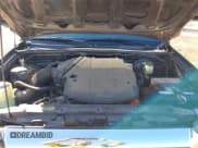 ✅ 2014 Toyota Tacoma PreRunner • VIN: 5TFJU4GN5EX058881 • Lot: 43603920. Listed on IAAI with 170,876 mi. Free auction sales archive from the USA and detailed vehicle history report at DreamBid. Image 10.