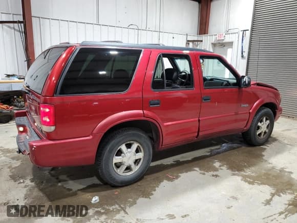 ✅ 2000 Oldsmobile Bravada • VIN: 1GHDT13W6Y2404218 • Лот: 49784485. Опубликован ранее на Copart с пробегом 128 841 миль. Бесплатный доступ к архиву аукционных продаж из США и подробный отчёт об истории автомобиля на DreamBid. Изображение 3.