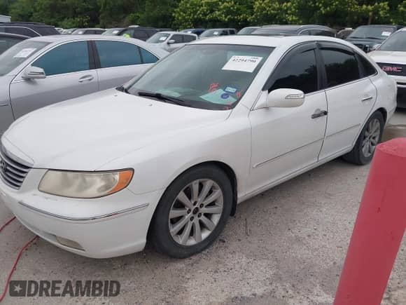 2009 Hyundai Azera Limited z VIN KMHFC46F39A358569, wystawiony jako IAAI lot #42294790 z przebiegiem 118 366 mil mil oraz . Historia ofert i sprzedaży dostępna na DreamBid. Obrazek 2.