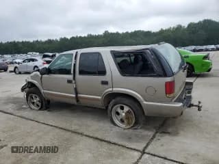 ✅ 2003 Chevrolet Blazer LS • VIN: 1GNDT13X53K140312 • Lot: 68031625. Wystawiony na Copart z przebiegiem 183 619 mil. Bezpłatny archiwum sprzedaży aukcyjnych z USA i szczegółowy raport historii pojazdu na DreamBid. Zdjęcie 2.