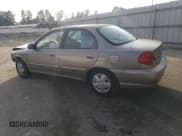✅ 2003 Kia Spectra • VIN: NCS100756 • Lot: 72712434. Wystawiony na Copart z przebiegiem 50 162 mil. Bezpłatny archiwum sprzedaży aukcyjnych z USA i szczegółowy raport historii pojazdu na DreamBid. Zdjęcie 2.