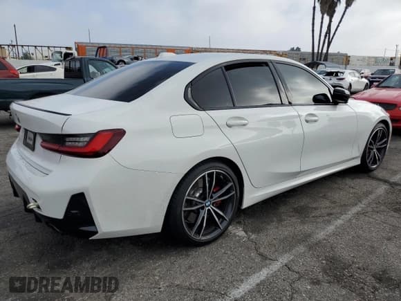 ✅ 2023 BMW 3 Series 330i • VIN: 3MW69FF08P8C99051 • Lot: 84225115. Listed on Copart with 22,941 mi. Free auction sales archive from the USA and detailed vehicle history report at DreamBid. Image 3.