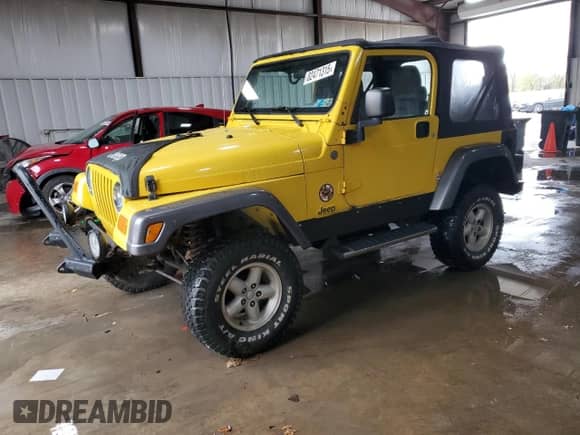 2004 Jeep Wrangler X with VIN 1J4FA39S24P739178, listed as a Copart auction lot 82471315 with 156,568 mi miles and Clean title. Bid and sale history available at DreamBid. Image 1.
