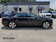 ✅ 2015 Bentley Flying Spur • VIN: SCBEC9ZA4FC041772 • Лот: 70284495. Опубликован ранее на Copart с пробегом 51 386 миль. Бесплатный доступ к архиву аукционных продаж из США и подробный отчёт об истории автомобиля на DreamBid. Изображение 13.