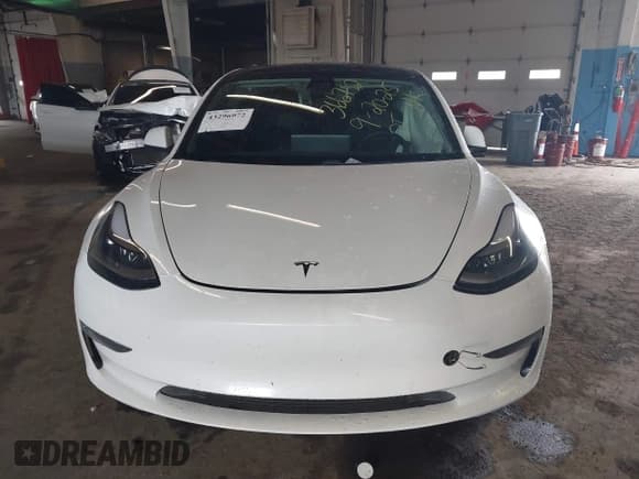 ✅ 2021 Tesla Model 3 Standard Range Plus • VIN: 5YJ3E1EA6MF009508 • Lot: 43296972. Listed on IAAI with 95,539 mi. Free auction sales archive from the USA and detailed vehicle history report at DreamBid. Image 12.