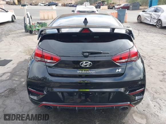 2022 Hyundai Veloster with VIN KMHT36AH1NU014206, listed as a IAAI auction lot 41202982 with 26,572 mi miles and . Bid and sale history available at DreamBid. Image 16.