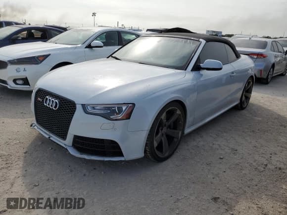 ✅ 2014 Audi RS 5 • VIN: WUAC6AFH6EN900719 • Lot: 76294014. Listed on Copart with 98,212 mi. Free auction sales archive from the USA and detailed vehicle history report at DreamBid. Image 1.