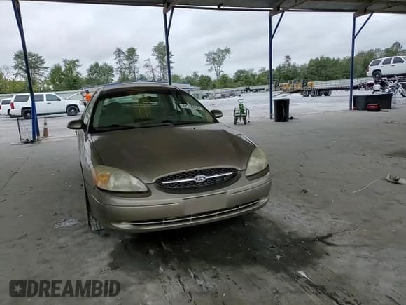 ✅ 2003 Ford Taurus SE Standard • VIN: 1FAFP532X3A164019 • Lot: 82216355. Listed on Copart with 109,933 mi. Free auction sales archive from the USA and detailed vehicle history report at DreamBid. Image 13.